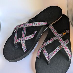 Teva brand Flip flops size 9 brand new  pink teal and black